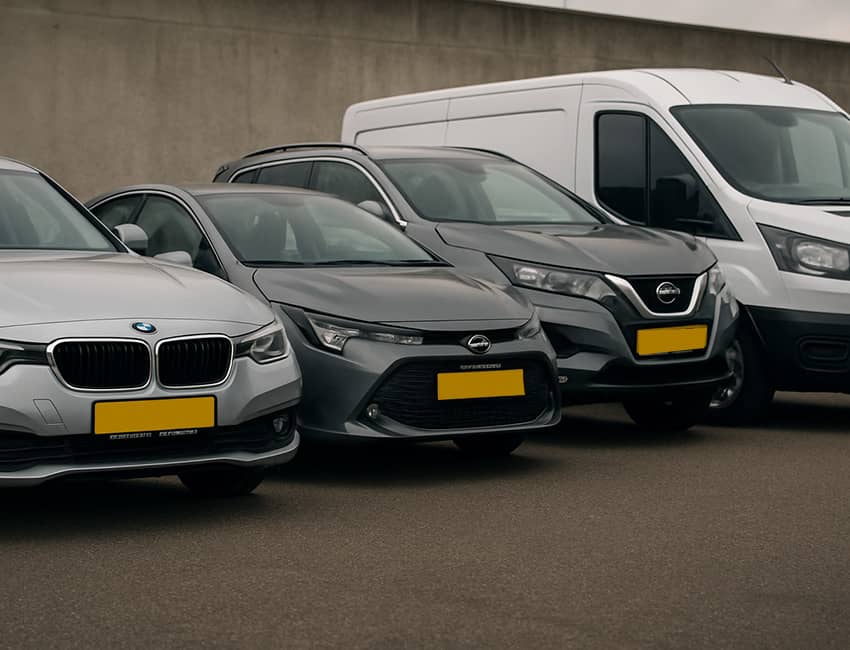 Modern vehicle rental office reception area with a car visible outside